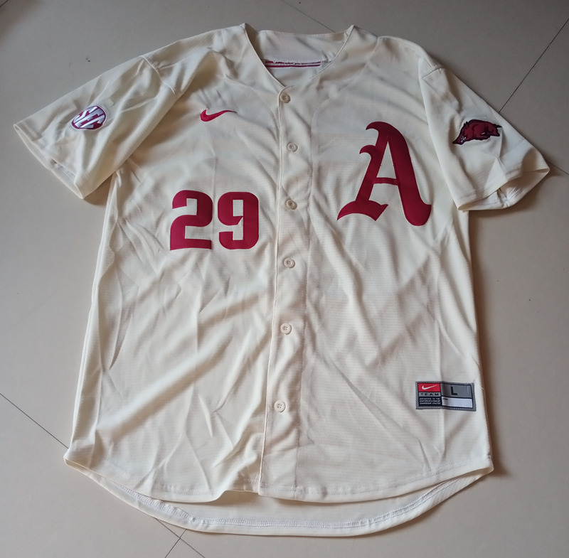 Men's Arkansas Razorbacks 45 Kevin Kopps Nike Cream College Baseball