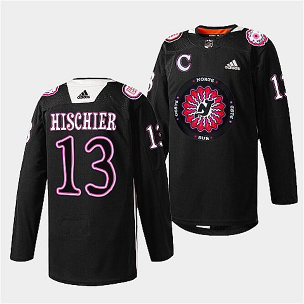 Mens New Jersey Devils #13 Nico Hischier  warms up in Hispanic Heritage night Jersey