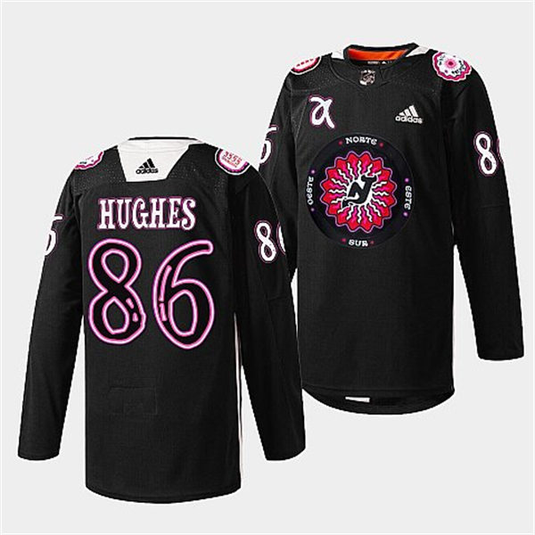 Mens New Jersey Devils #86 Jack Hughes warms up in Hispanic Heritage night Jersey