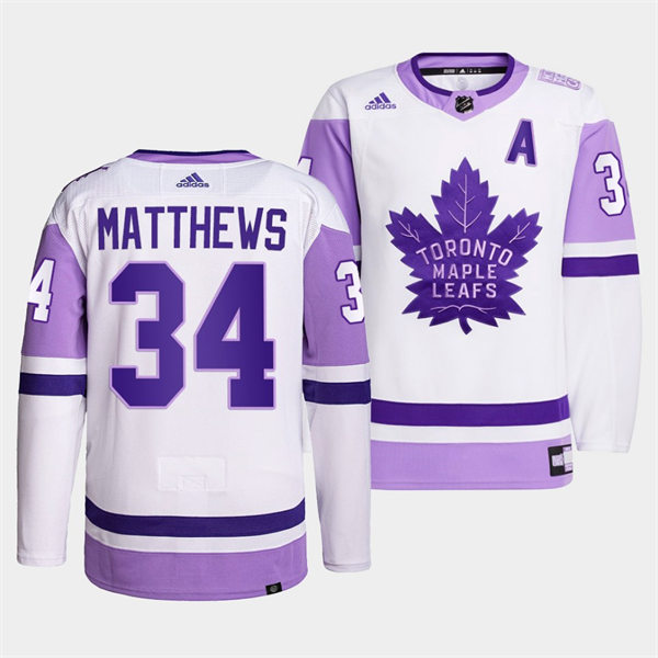 Men's Toronto Maple Leafs #34 Auston Matthews 2021-22 White Purple Hockey Fights Cancer Primegreen Jersey