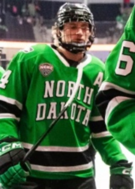 North Dakota Fighting Hawks #4 Jake Livanavage 2026 Green College Hockey Game Jersey.jpg