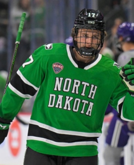 North Dakota Fighting Hawks #17 Cole Reschny 2026 Green College Hockey Game Jersey.jpg
