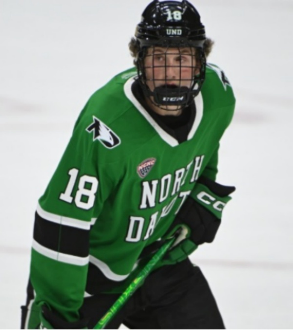 North Dakota Fighting Hawks #18 Keaton Verhoeff 2026 Green College Hockey Game Jersey.jpg