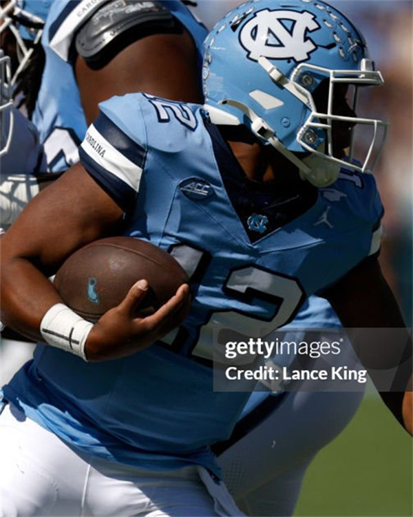 Mens North Carolina Tar Heels #12 Jacolby Criswell Royal Retro Untouchable College Football Jersey
